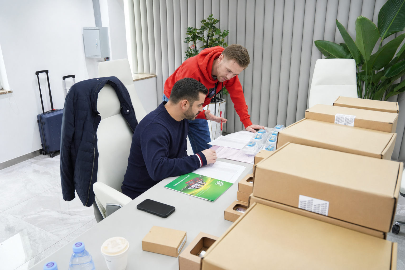 International customers checking industrial automation products before shipment