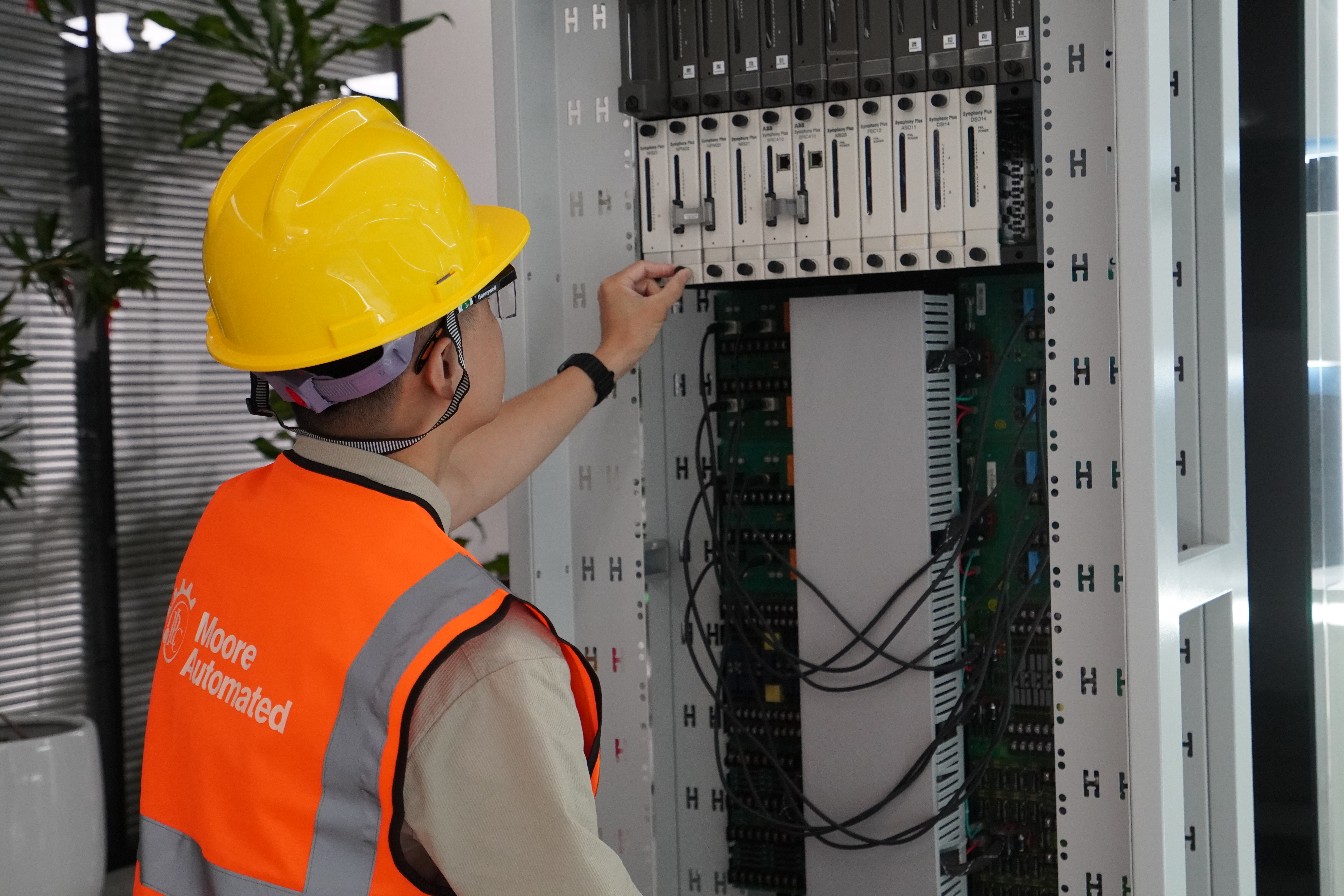 Technical review at an industrial control cabinet